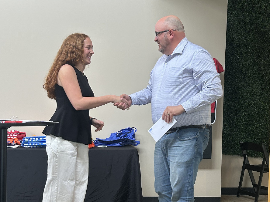 man and woman shaking hands